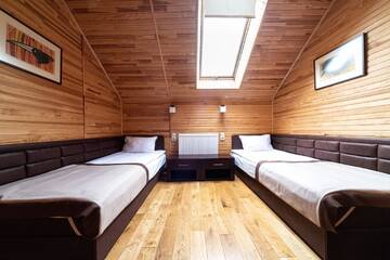 Фото номера Стандартный семейный номер Отель Chalet du Mont г. Буковель 2