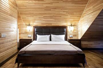 Фото номера Люкс с 2 спальнями и балконом Отель Chalet du Mont г. Буковель 4
