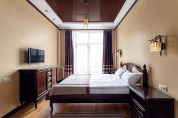 Фото номера Люкс с 1 спальней и балконом Отель Chalet du Mont г. Буковель 4