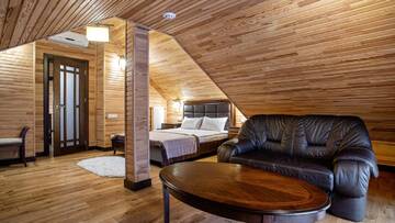 Фото номера Стандартный семейный номер Отель Chalet du Mont г. Буковель 5