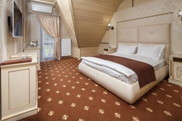 Фото номера Люкс с кроватью размера «king-size», камином, балконом и доступом в спа-центр Отель Chevalier Hotel &amp; SPA г. Буковель 2