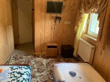 Фото номера Бюджетный двухместный номер с 2 отдельными кроватями Отель Hotel Bugel г. Буковель 3