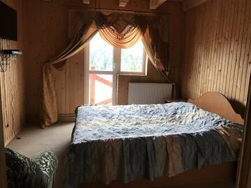 Фото номера Двухместный номер с 1 кроватью Отель Hotel Bugel г. Буковель 3