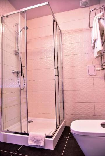 Фото номера Четырехместный номер Делюкс Отель Отель «Goral Hotel &amp; Spa» г. Буковель 9