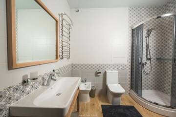 Фото номера Коттедж с 3 спальнями Курортные отели Westhills г. Буковель 6