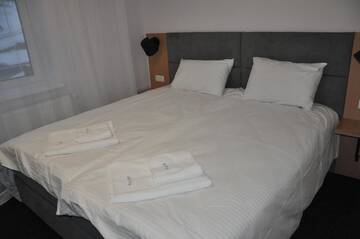 Фото номера Двухместный номер с 1 кроватью Отель Grofa Room г. Буковель 19