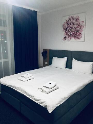 Фото номера Улучшенный трехместный номер Отель Grofa Room г. Буковель 2