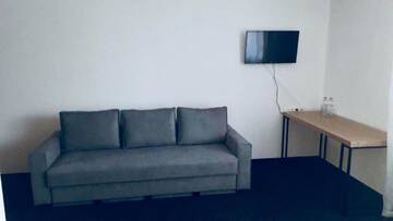 Фото номера Улучшенный трехместный номер Отель Grofa Room г. Буковель 4