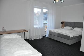 Фото номера Улучшенный трехместный номер Отель Grofa Room г. Буковель 7