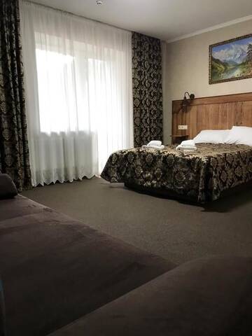 Фото номера Семейный номер с видом на горы Отель Grofa Room г. Буковель 3