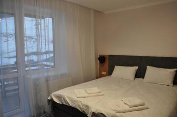 Фото номера Двухместный номер с 1 кроватью Отель Grofa Room г. Буковель 10