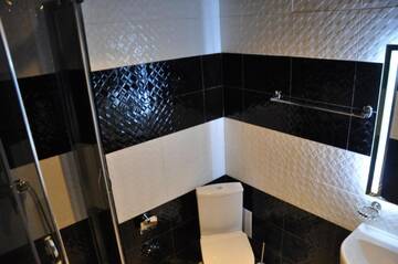 Фото номера Улучшенный трехместный номер Отель Grofa Room г. Буковель 9