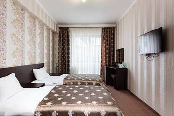Фото номера Люкс с 2 спальнями Отель Kasimir Resort Hotel г. Буковель 11