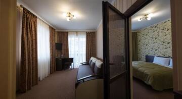 Фото номера Люкс с 2 спальнями Отель Kasimir Resort Hotel г. Буковель 9