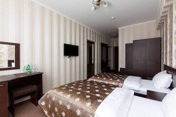Фото номера Люкс с 2 спальнями Отель Kasimir Resort Hotel г. Буковель 13