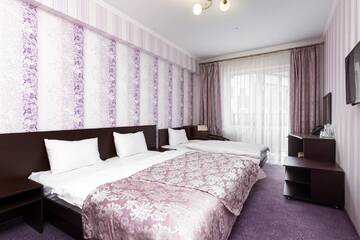 Фото номера Стандартный трехместный номер Отель Kasimir Resort Hotel г. Буковель 2