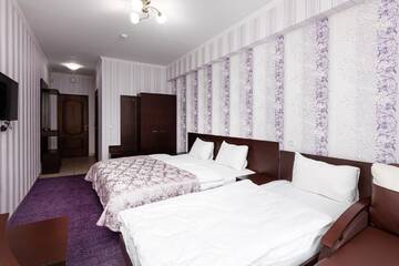 Фото номера Стандартный трехместный номер Отель Kasimir Resort Hotel г. Буковель 3