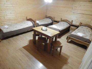 Фото номера Стандартный четырехместный номер Отель Greku Hotel г. Буковель 2