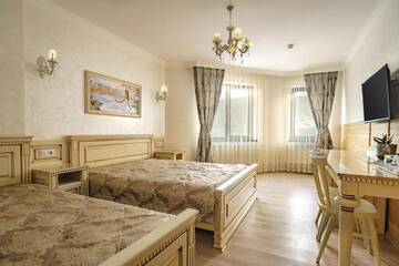 Фото номера Трехместный номер с доступом в спа-центр Отель Mardan Palace SPA Resort г. Буковель 3