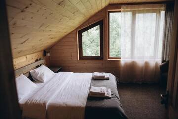 Фото номера Двухместный номер с 1 кроватью Гостевой дом Konopka Guest House г. Буковель 23