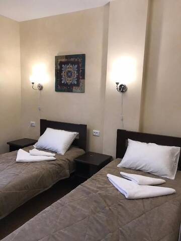Фото номера Двухместный номер с 2 отдельными кроватями Отель Private Rooms in Grofa Hotel г. Буковель 12