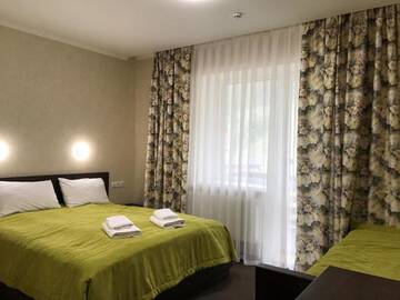 Фото номера Трехместный номер Отель Private Rooms in Grofa Hotel г. Буковель 8