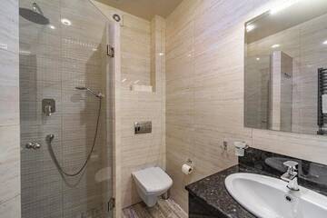 Фото номера Стандартный трехместный номер Отель Diamond Resort White г. Буковель 9