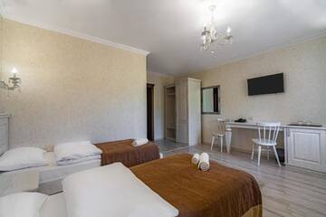 Фото номера Двухместный номер с 2 отдельными кроватями Отель Diamond Resort White г. Буковель 2