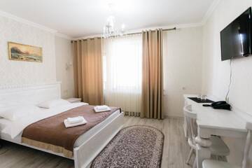 Фото номера Стандартный двухместный номер с 1 кроватью Отель Diamond Resort White г. Буковель 2