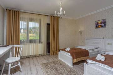 Фото номера Двухместный номер с 2 отдельными кроватями Отель Diamond Resort White г. Буковель 3