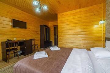 Фото номера Стандартный двухместный номер с 1 кроватью Отель Diamond Resort White г. Буковель 4