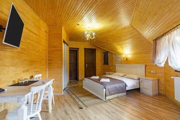 Фото номера Двухместный номер с 1 кроватью - Мансарда Отель Diamond Resort White г. Буковель 2