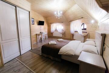 Фото номера Двухместный номер с 1 кроватью - Мансарда Отель Diamond Resort White г. Буковель 4