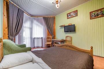 Фото номера Двухместный номер с 1 кроватью Гостевой дом Hotel Familiia г. Буковель 6