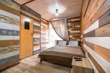 Фото номера Улучшенный двухместный номер с 1 кроватью Гостевой дом Hotel Familiia г. Буковель 3