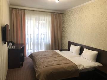 Фото номера Двухместный номер с 1 кроватью Отель Bukovel Kazimir Rooms г. Буковель 12