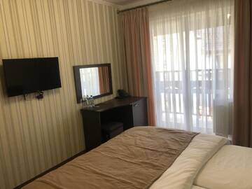 Фото номера Двухместный номер с 1 кроватью Отель Bukovel Kazimir Rooms г. Буковель 11