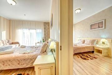 Фото номера Суперлюкс с 2 спальнями, посещение спа-центра Отель Hotel Podgore Spa &amp; Resort г. Буковель 14