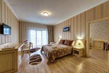 Фото номера Суперлюкс с 2 спальнями, посещение спа-центра Отель Hotel Podgore Spa &amp; Resort г. Буковель 15