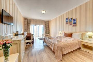 Фото номера Семейный полулюкс с доступом в спа-центр Отель Hotel Podgore Spa &amp; Resort г. Буковель 4