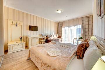 Фото номера Семейный полулюкс с доступом в спа-центр Отель Hotel Podgore Spa &amp; Resort г. Буковель 2