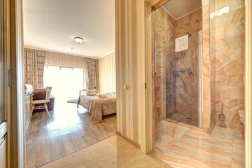 Фото номера Семейный полулюкс с доступом в спа-центр Отель Hotel Podgore Spa &amp; Resort г. Буковель 6