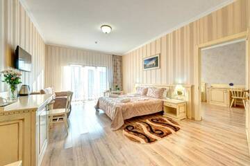 Фото номера Семейный номер Делюкс с доступом в спа-центр Отель Hotel Podgore Spa &amp; Resort г. Буковель 4