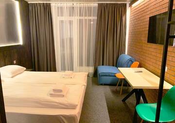 Фото номера Улучшенный номер с кроватью размера «king-size» Отель Loft Hotel г. Буковель 5