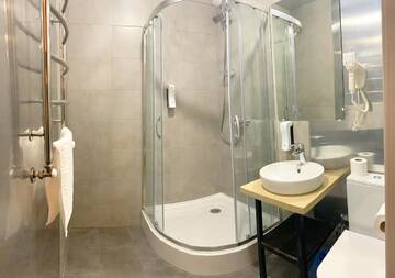 Фото номера Улучшенный четырехместный номер Отель Loft Hotel г. Буковель 4