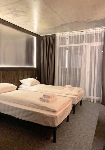 Фото номера Двухместный номер с 1 кроватью или 2 отдельными кроватями Отель Loft Hotel г. Буковель 6
