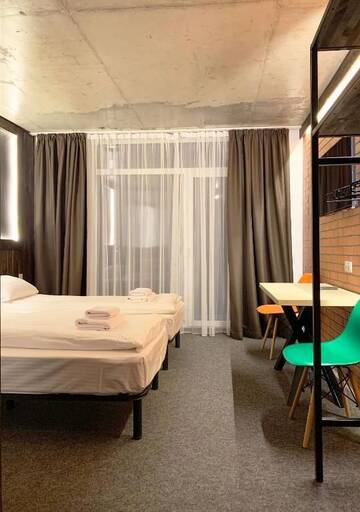 Фото номера Двухместный номер с 1 кроватью или 2 отдельными кроватями Отель Loft Hotel г. Буковель 7