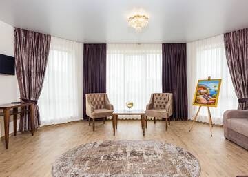 Фото номера Улучшенный люкс с балконом Отель Villa Livorno г. Буковель 4