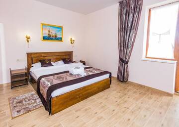 Фото номера Стандартный двухместный номер с 1 кроватью и балконом Отель Villa Livorno г. Буковель 4