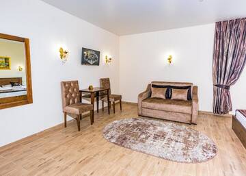 Фото номера Трехместный номер Делюкс Отель Villa Livorno г. Буковель 4
